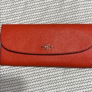 Orange coach wallet